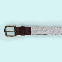 Close up picture of White Basket Beaded Leather Belt and brass buckle.