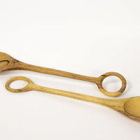 Two olive wood spoons with loop handle