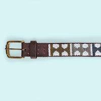 Close up photo of Arrows Metallic Beaded Leather Belt and brass belt buckle.
