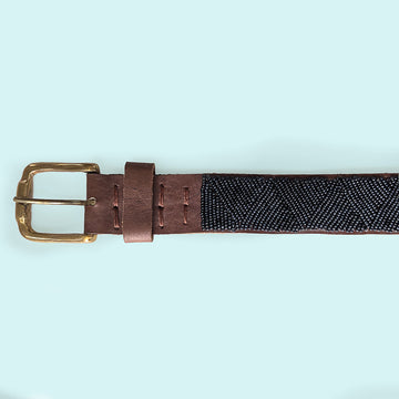 Close up photo of Basket Slate Beaded Leather Belt and brass belt buckle.