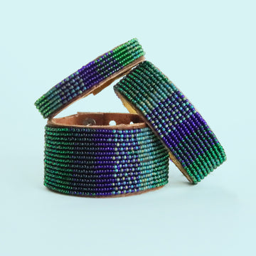 Group photo of large, medium and small Gradient Peacock Beaded Leather Cuff