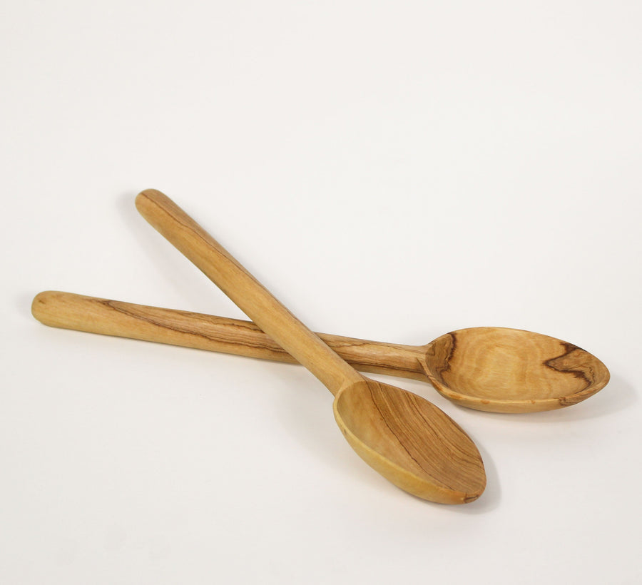 Two thin kitchen spoons