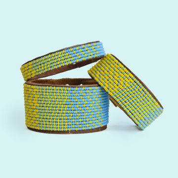 Group photo of large, medium, and small Light Blue and Yellow Beaded Leather Cuff